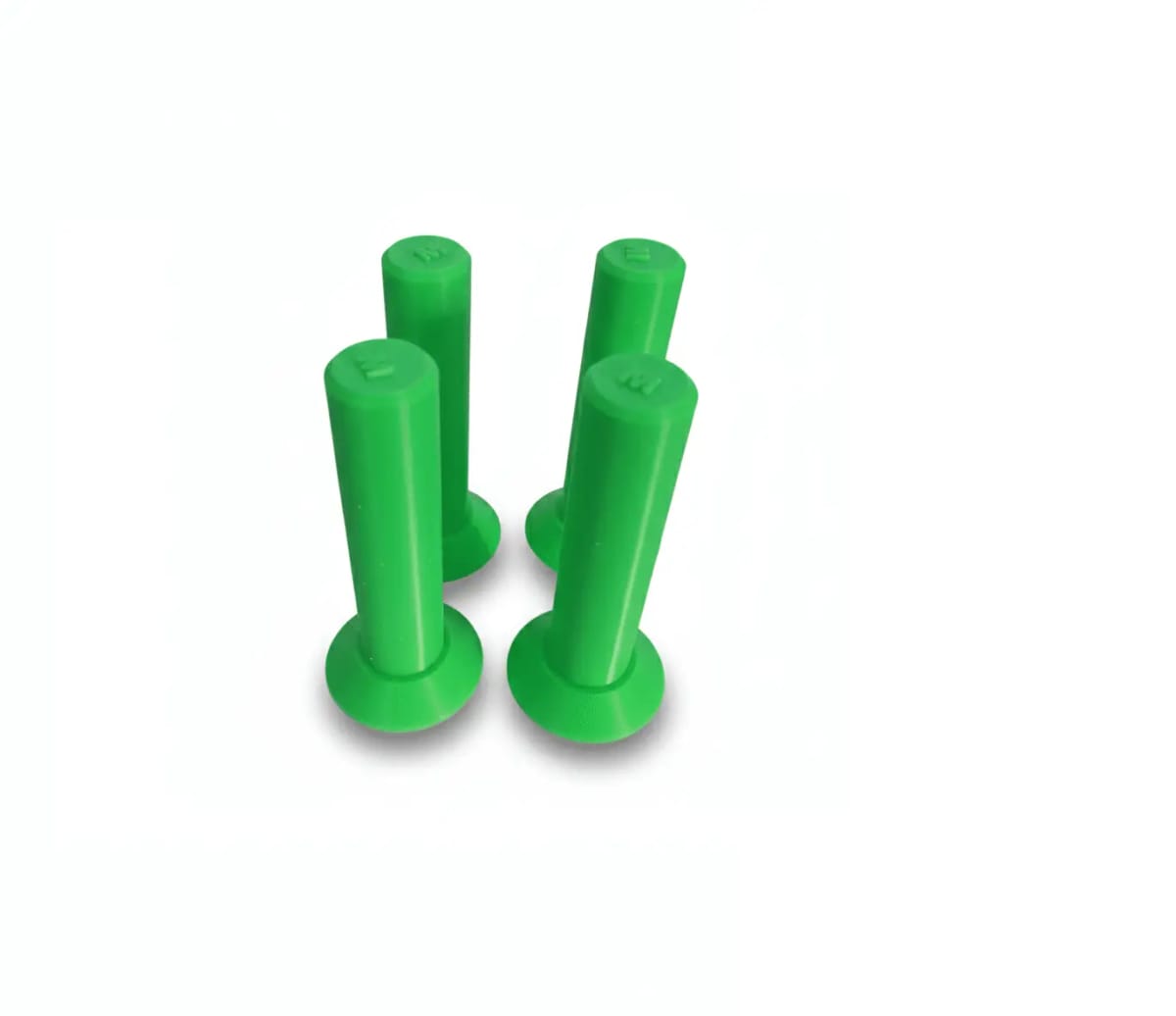 Four green camlock mounts standing on their magnetic bases