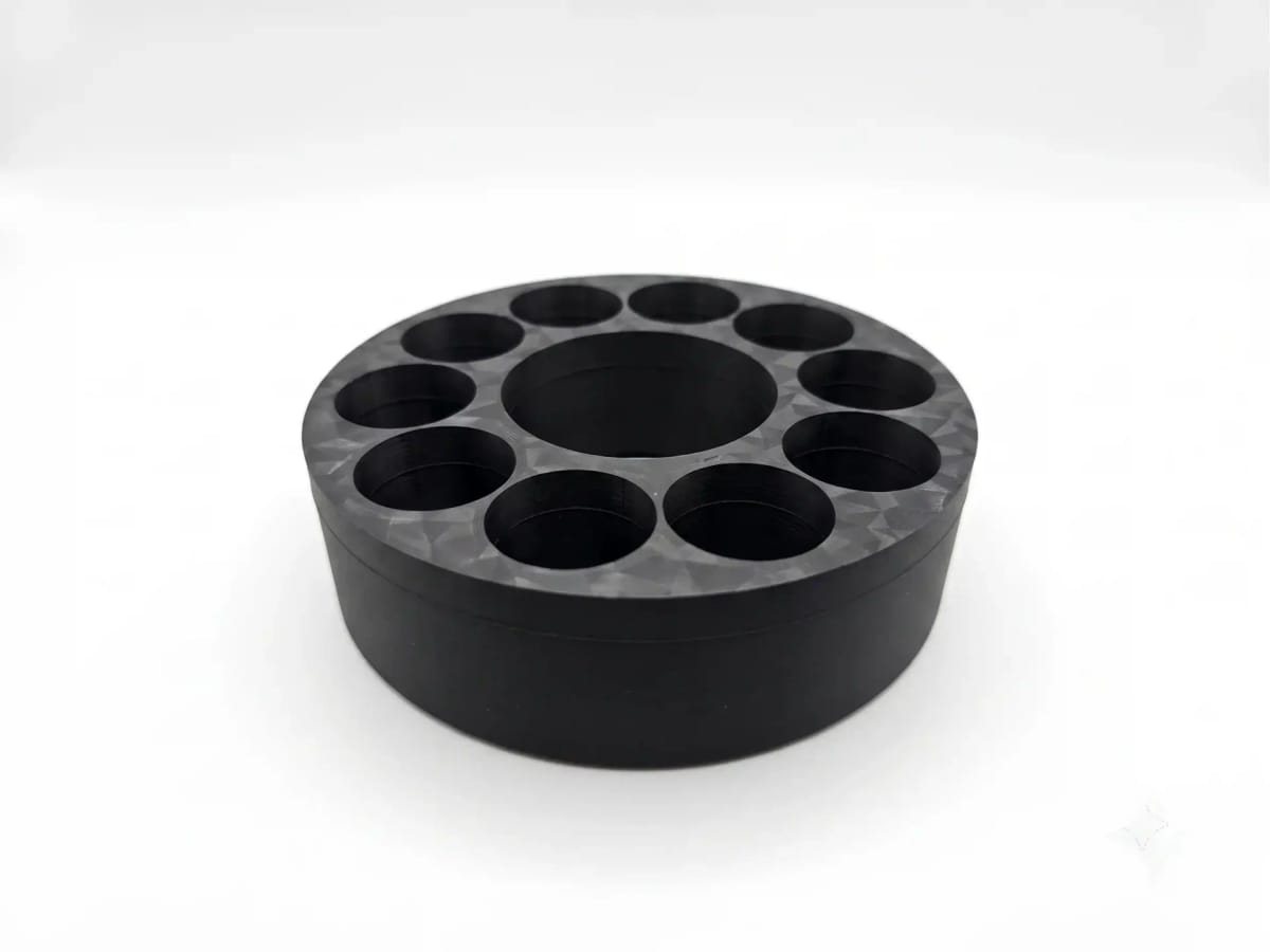 A round black base support with holes, for split-type PSA filters