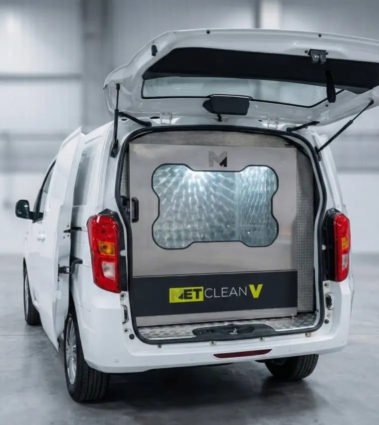 A METClean V compact cabinet fitted in the back of a white van with the tailgate raised